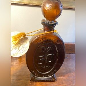 50 years OMCO Decanter bottle - Hillsboro Glass Company - embossed Amber glass